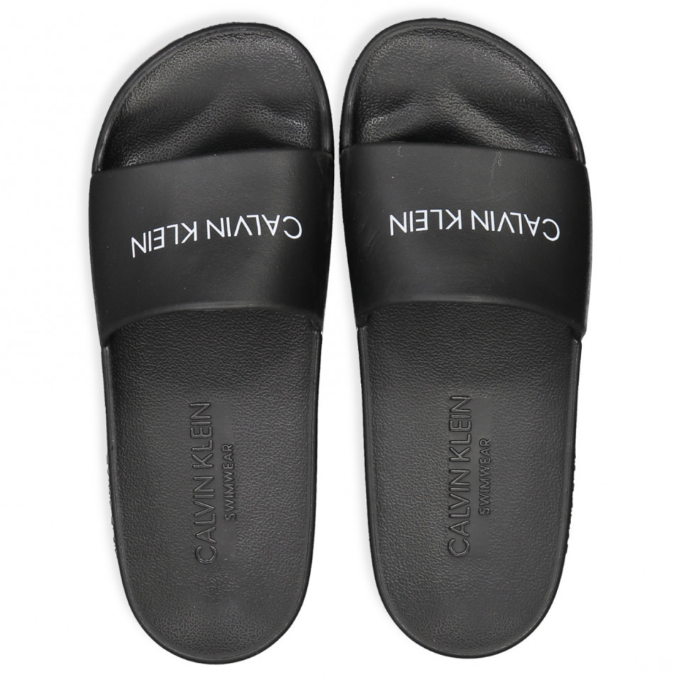 Black calvin klein flip flops 2025